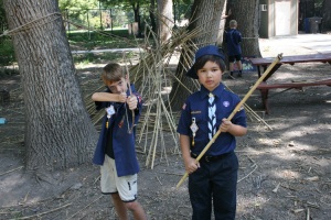 young scouts showing off their primitive weapons they produced in the ArtPark (of their own volition)